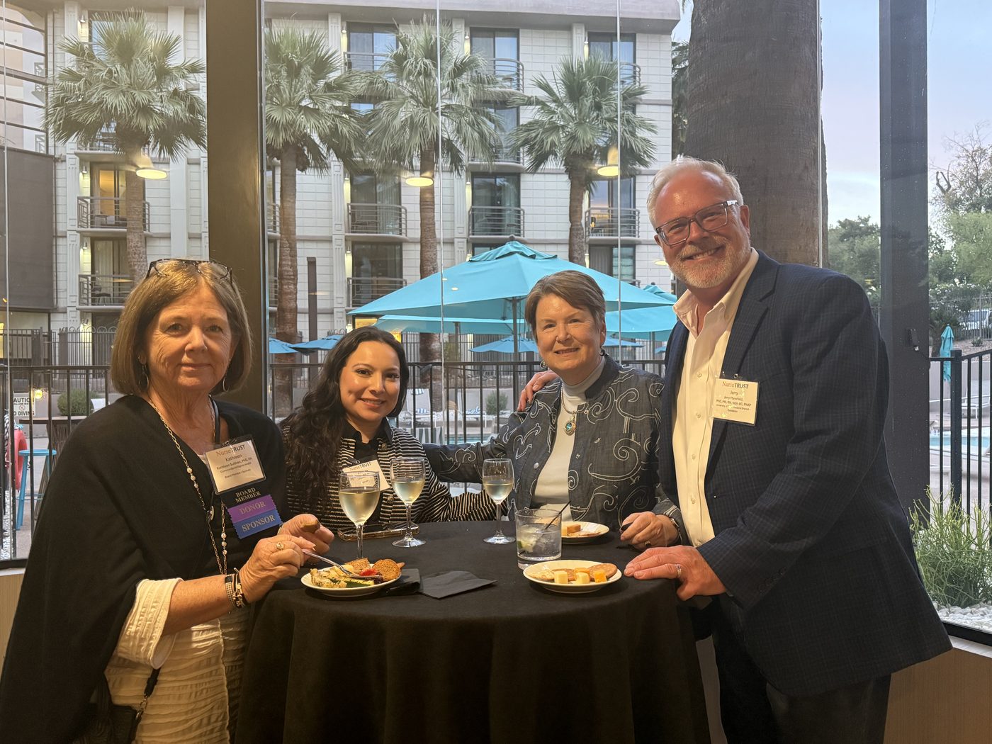 Attendees networking at a reception