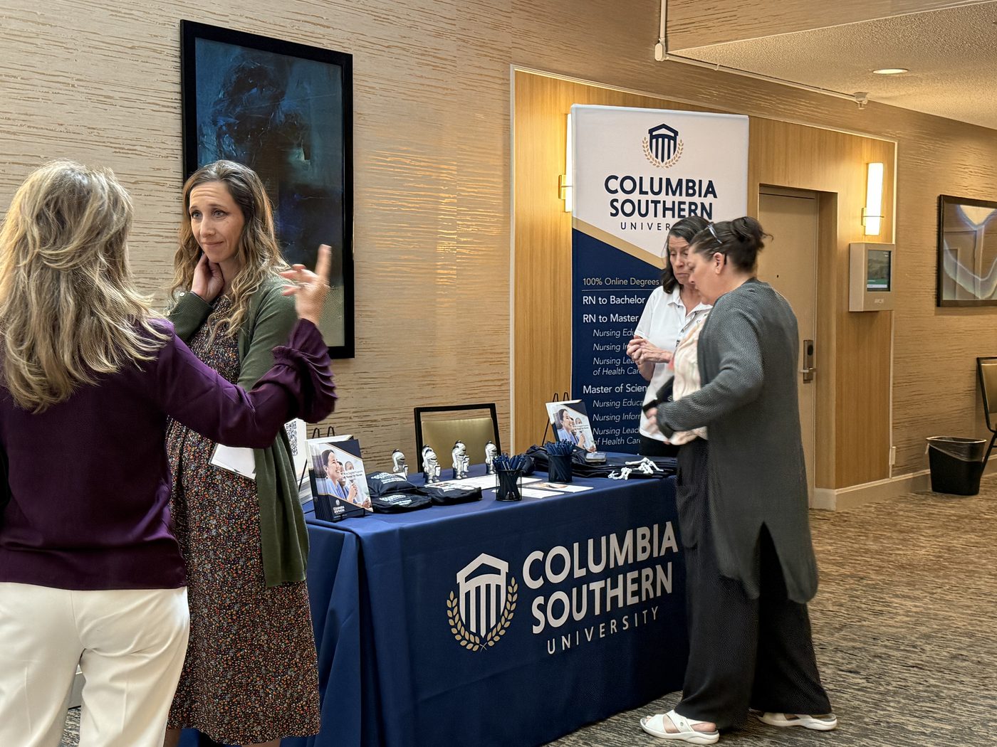 Conversation at an exhibitor booth