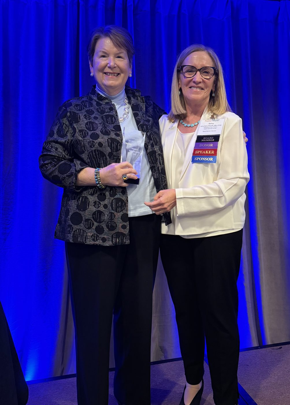 Award recognition on stage